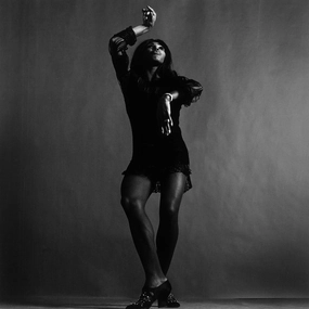 "Tina Turner, Hand Above Head" from Getty Imagesnordic style wall decor