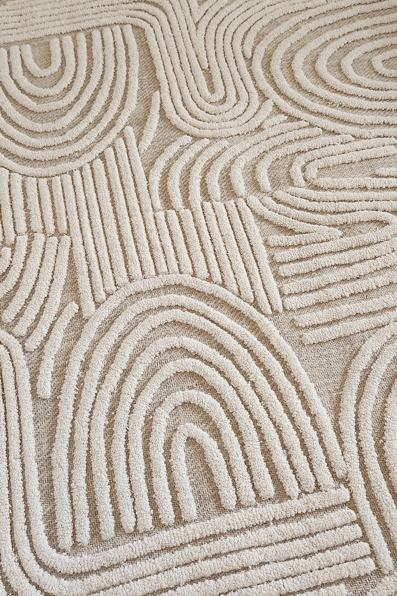 Maisie Cream and Ivory Textured Tribal Rug