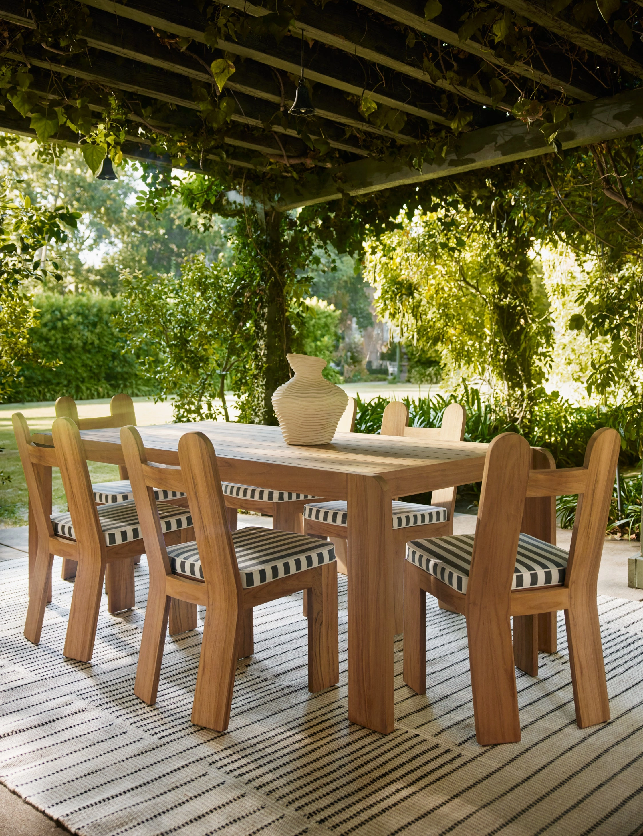 Shere Handwoven Indoor / Outdoor Rug by Sarah Sherman Samueloutdoor wrought iron plant stand