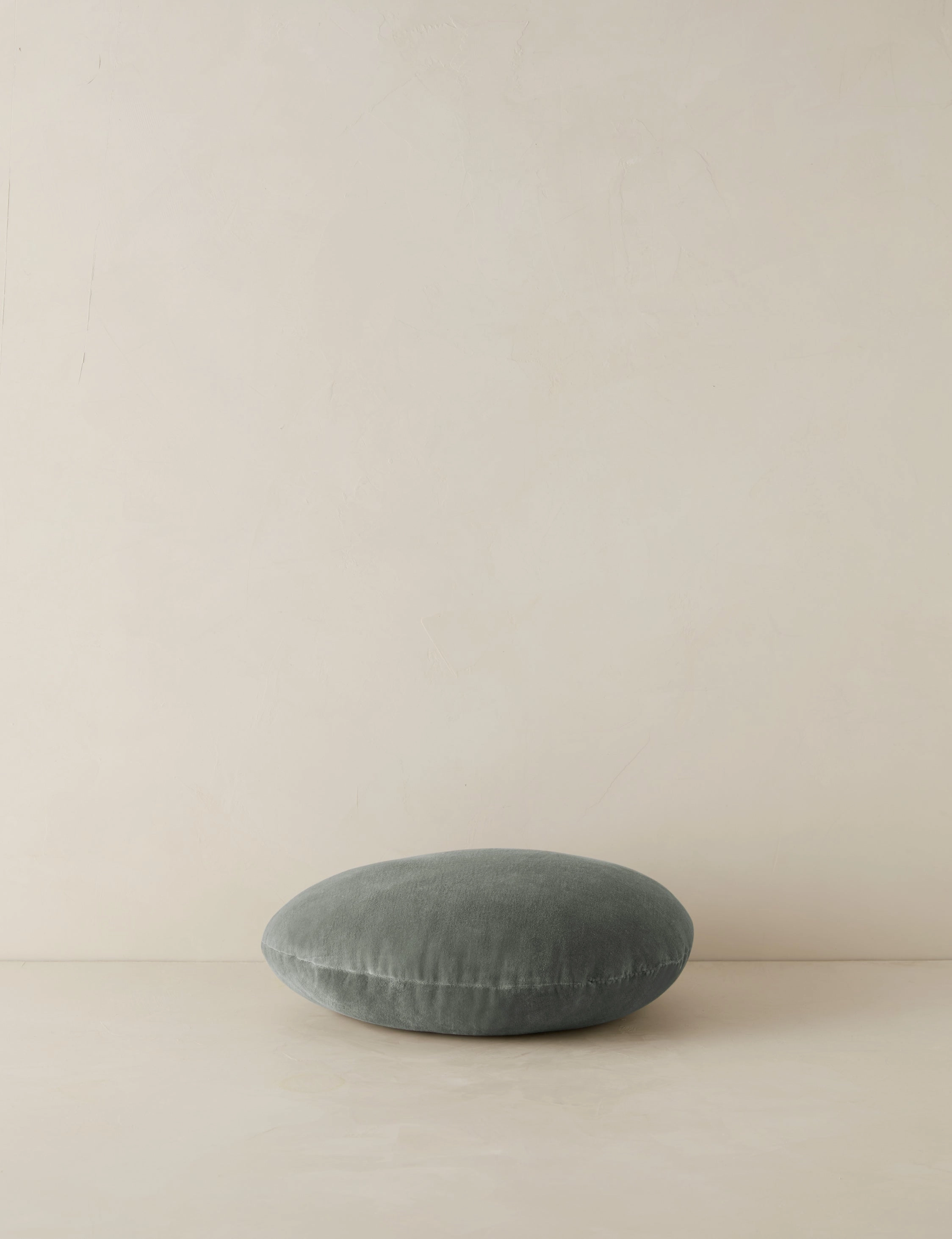 Velvet Round Pillow by Sarah Sherman Samuel